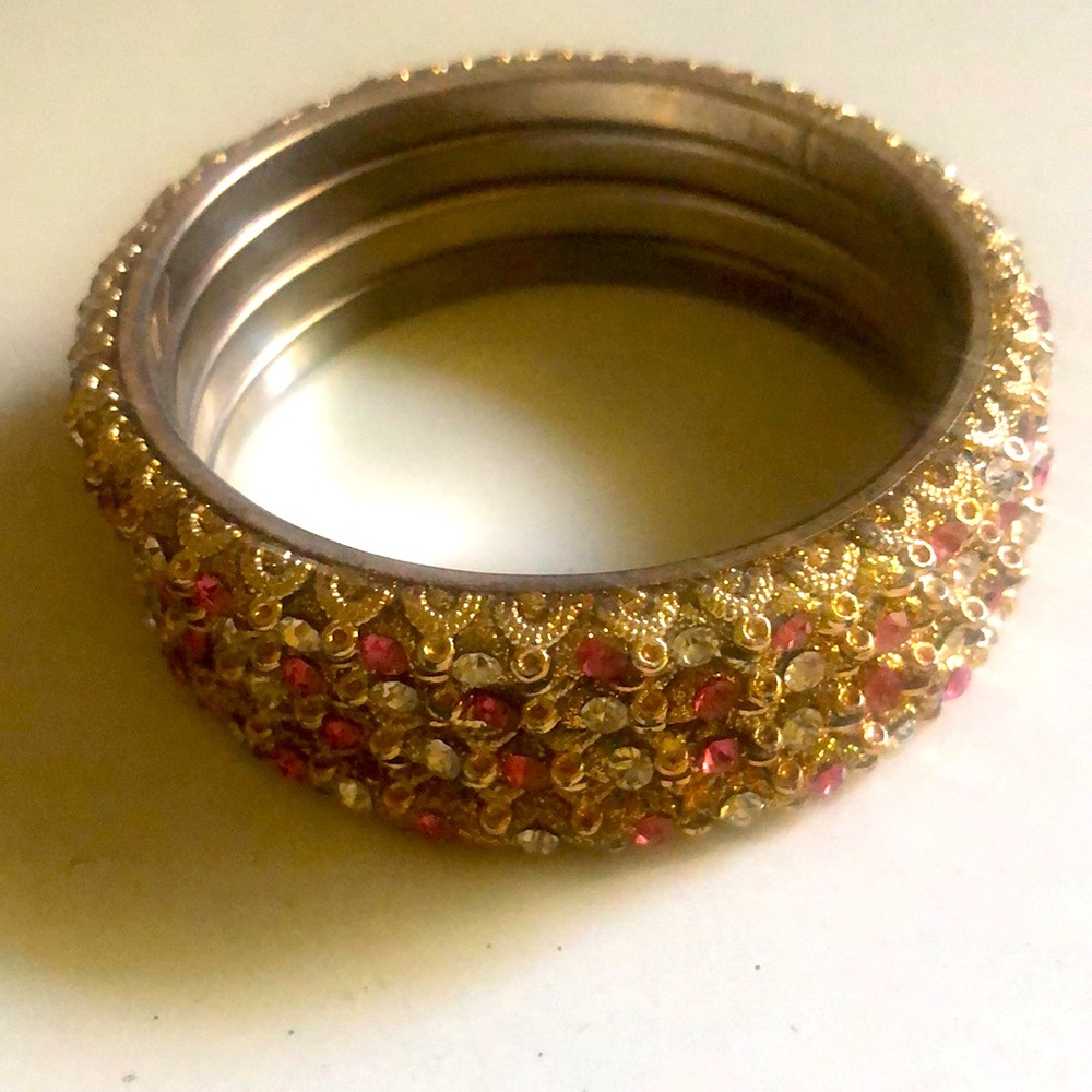 Brand new set of 4 Bangles